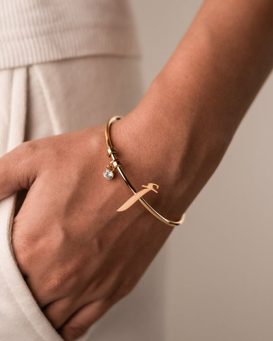 Initial Cuff أ